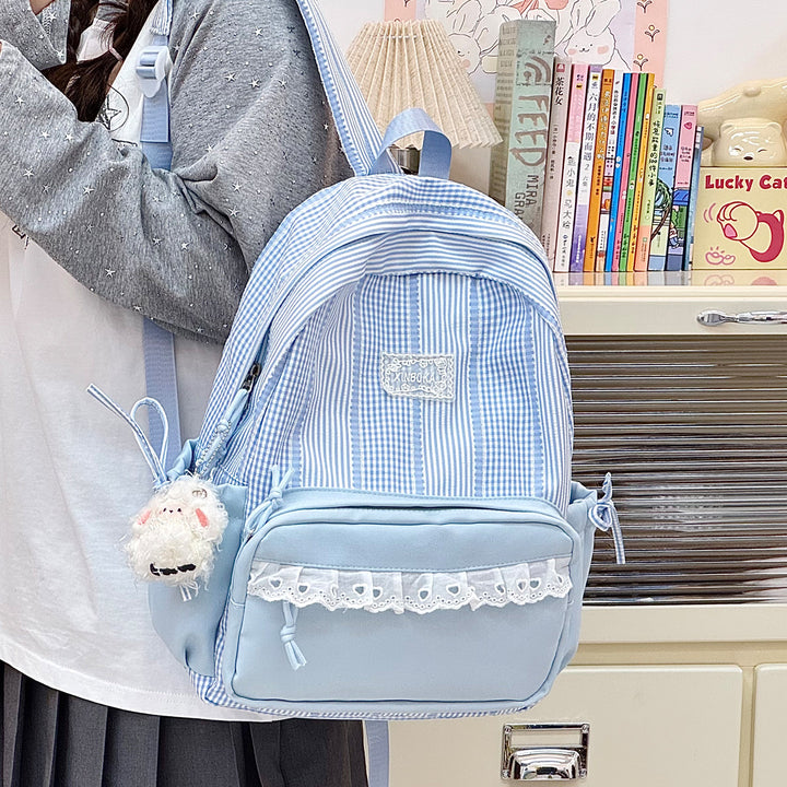 Stylischer gestreifter Rucksack mit dekorativen Akzenten Karnz