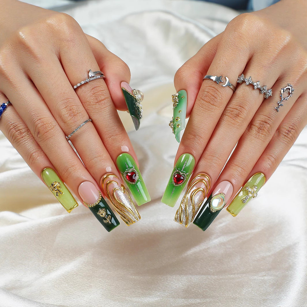 Kunstnagelset mit glamourosem Kristall- und floralem Design Karnz