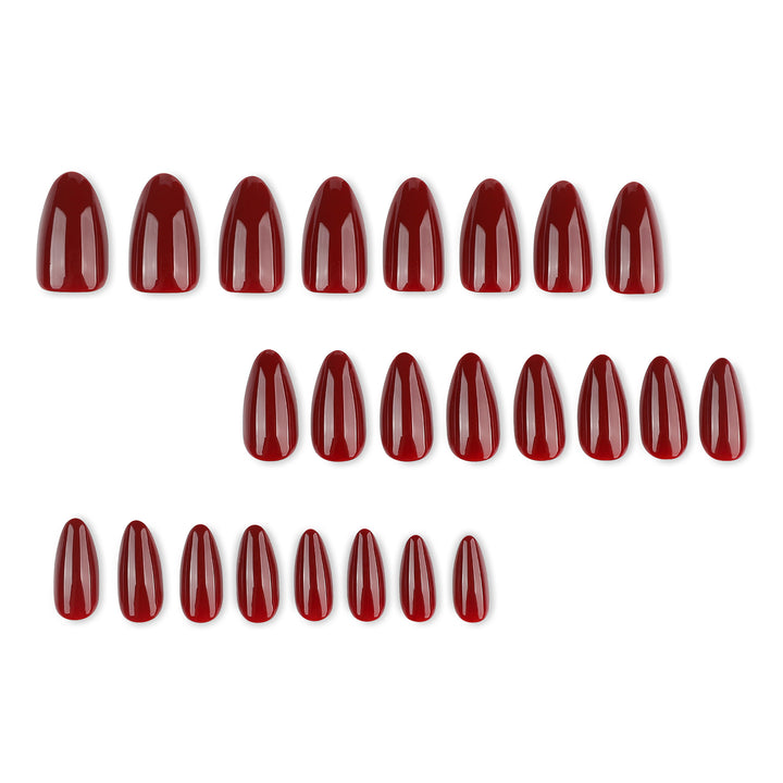 Glamouröse Stiletto-Nägel mit Hochglanz- und eleganten Designakzenten Karnz