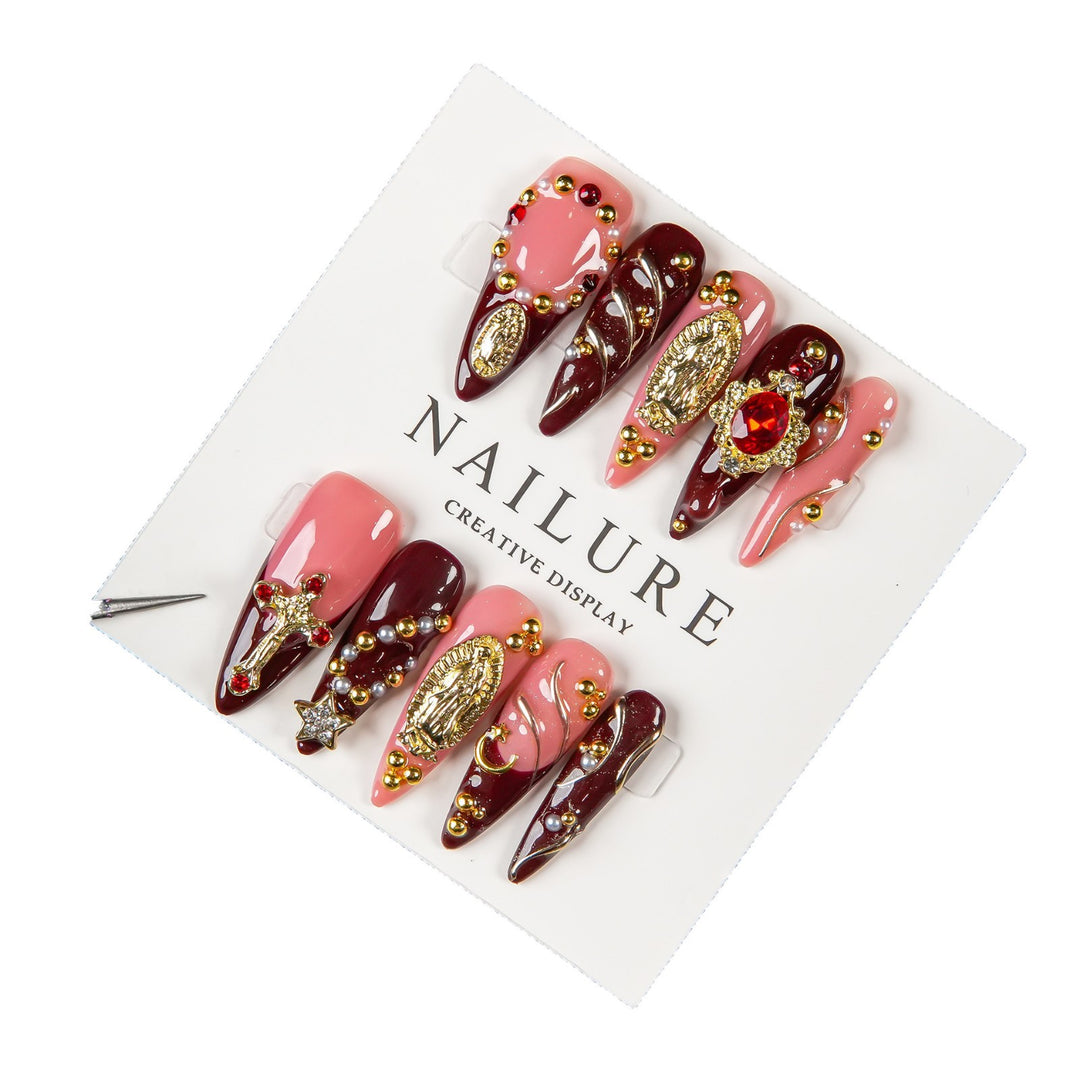 Künstlerisches Stiletto Press-On Nagelset mit Edelsteinakzenten