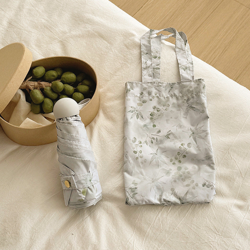 Damen Faltbarer Regenschirm mit elegantem botanischem Muster Karnz