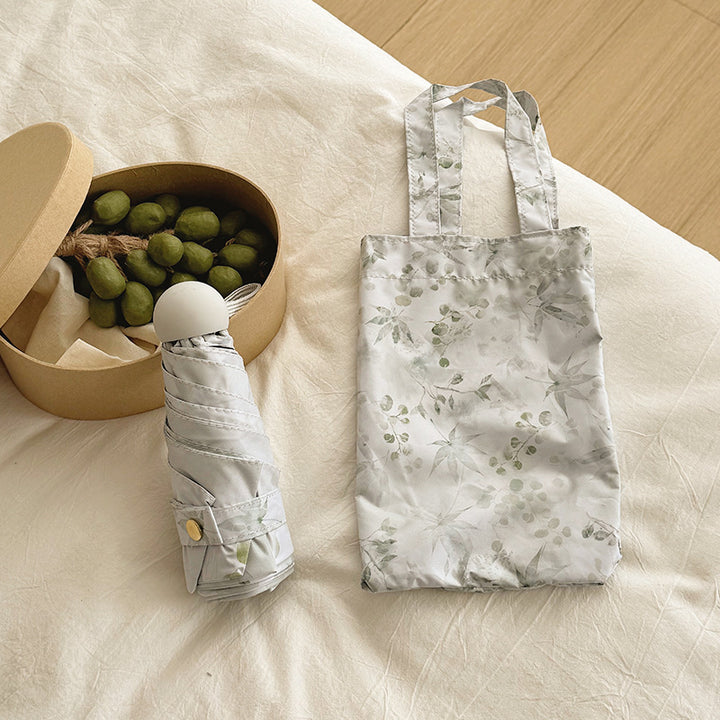 Damen Faltbarer Regenschirm mit elegantem botanischem Muster Karnz