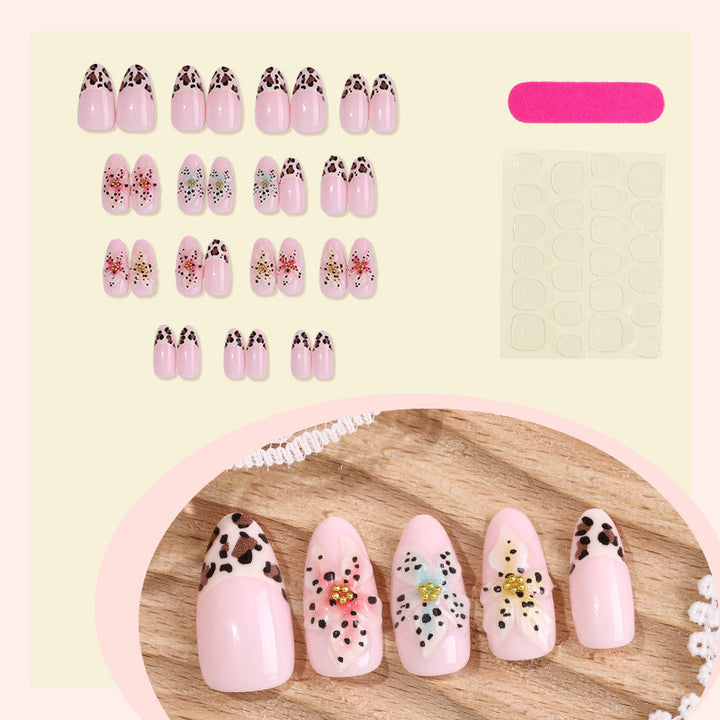 Kunstnagelset mit floralen und tierischen Motiven Karnz