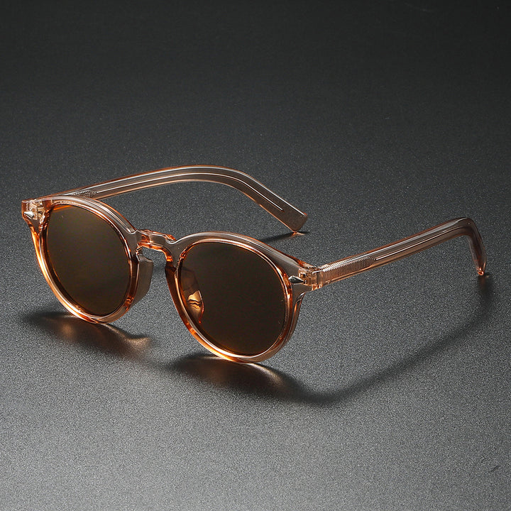 Damen Rund-Sonnenbrille mit transparentem Rahmen und reflektierenden Gläsern Karnz