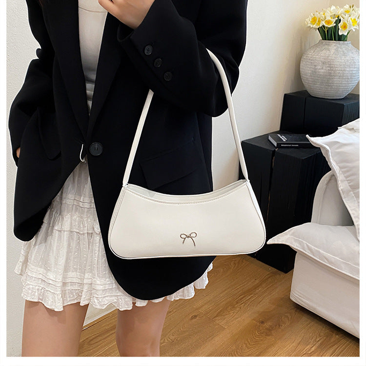 Elegante geschwungene Handtasche Karnz