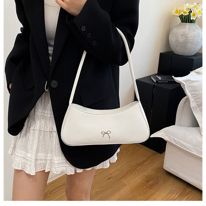 Elegante geschwungene Handtasche Karnz