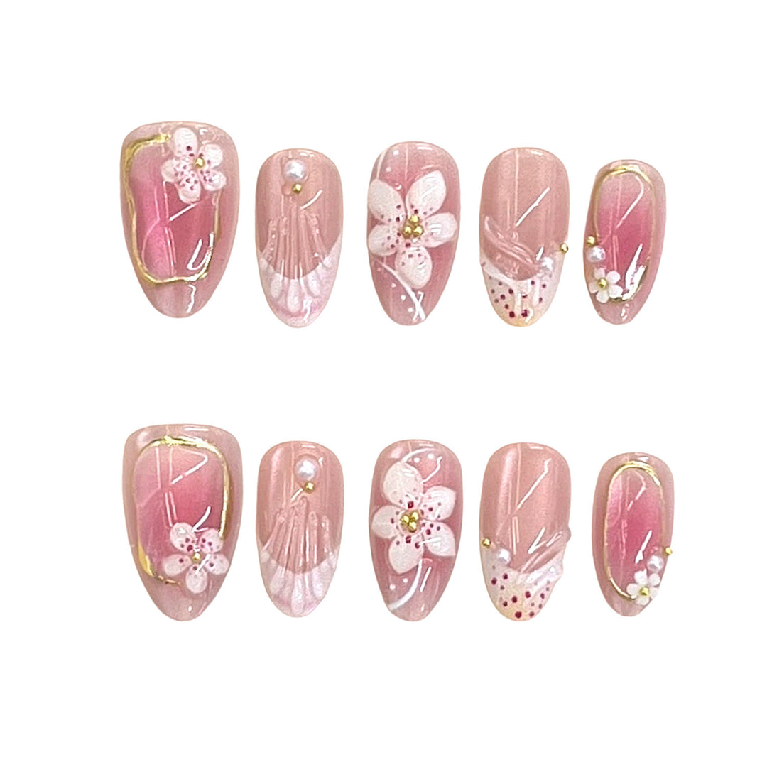 Detailliertes florales Design Press-On Nagelset Karnz