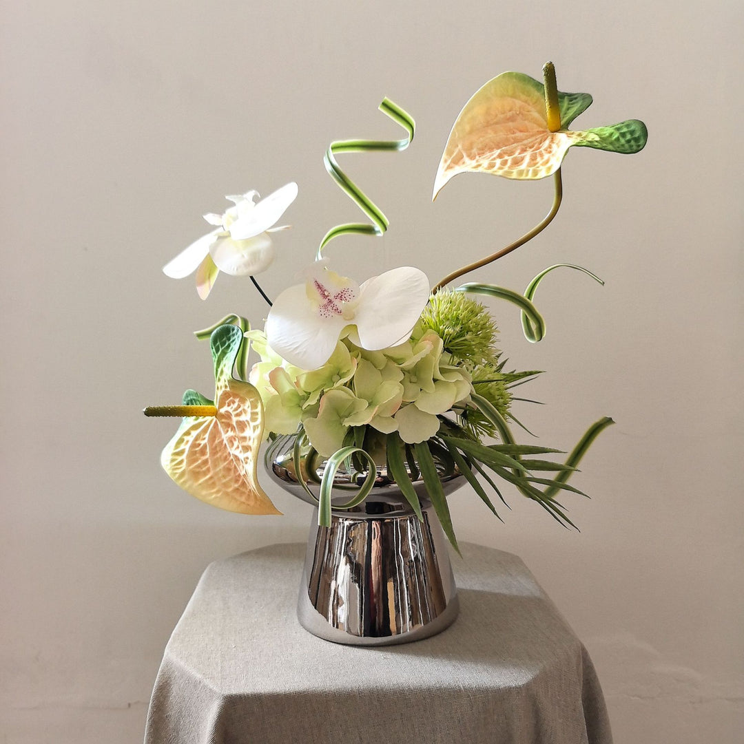 Elegante künstliche Blumenarrangement
