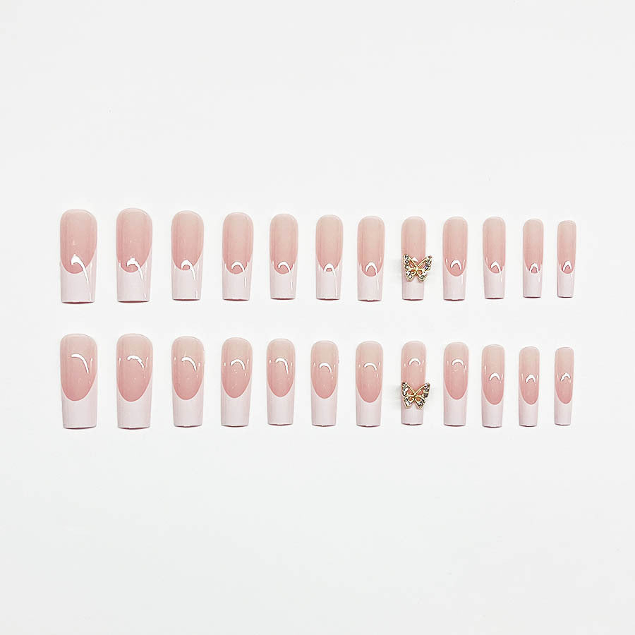 Elegantes Kunstnagelset mit Schmetterlingsakzenten Karnz