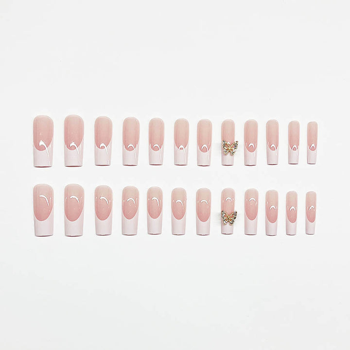Elegantes Kunstnagelset mit Schmetterlingsakzenten Karnz