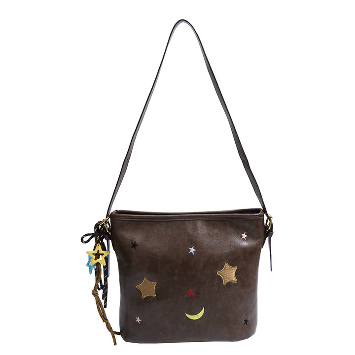 Schultertasche mit Charmanten Applikationen Karnz