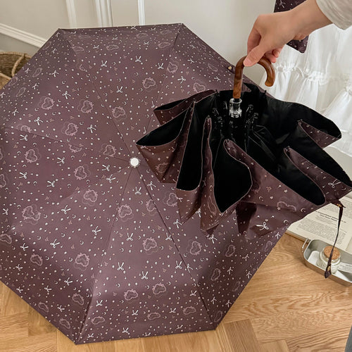 Damen Faltregenschirm mit elegantem Anhängerdesign Karnz