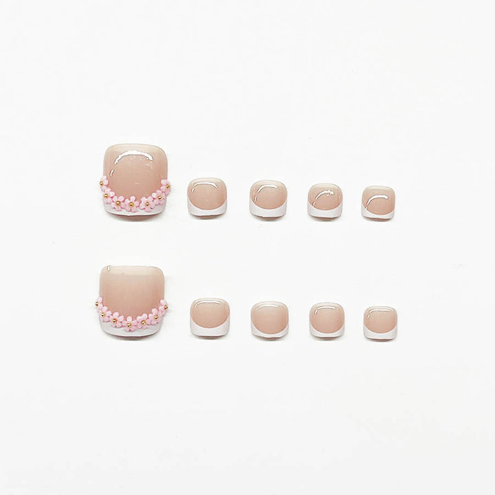 Fußnagelkunstset mit elegantem French Design und Glamourösen Strassakzenten Karnz