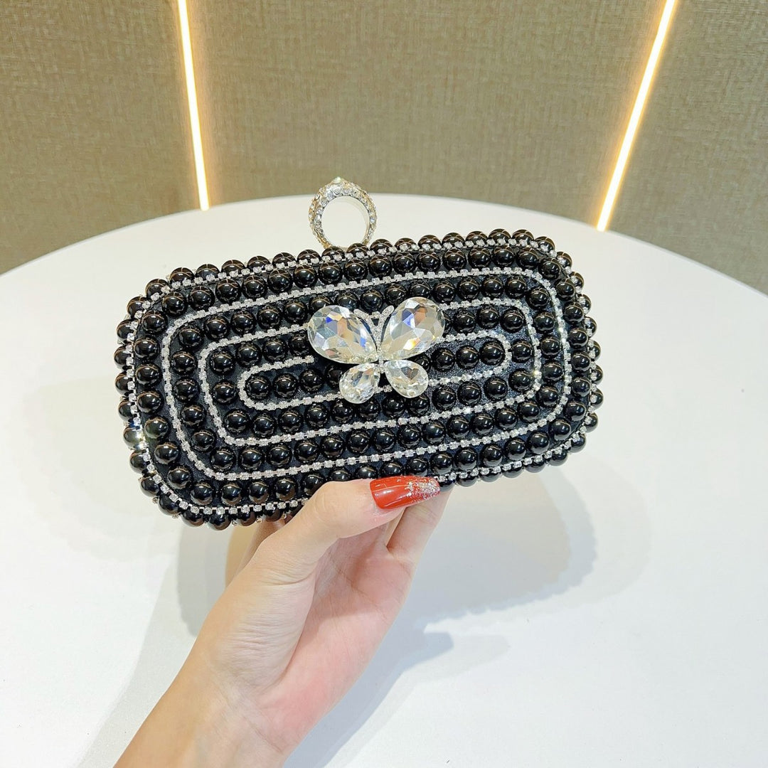 Perlenbesetzte Schmetterlings-Abend-Clutch