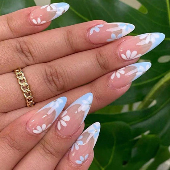 Spitzmandelförmige Press-On Nägel mit floralen Design Karnz