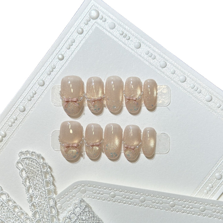 Press-On-Nagelkunst-Set mit eleganten Schleifenakzenten Karnz