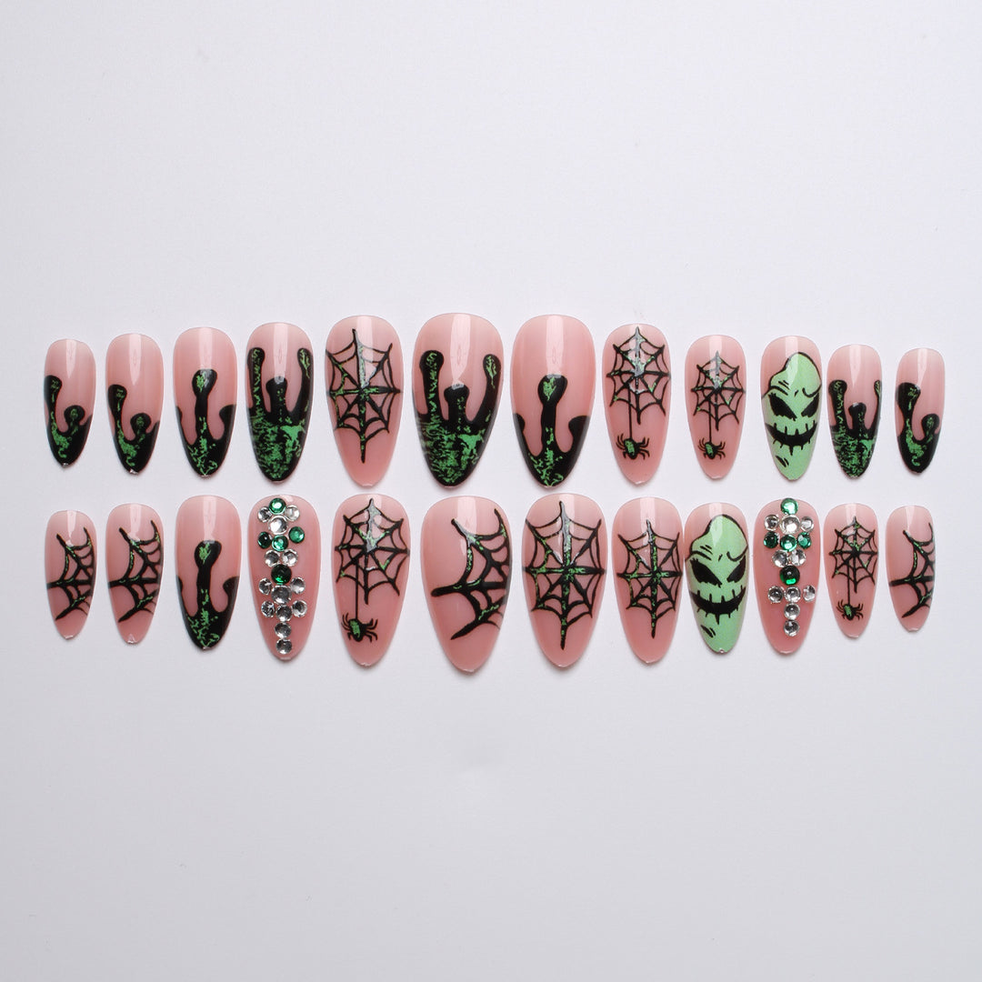 Kunstnägel mit Halloween-Spider-Design und Glitzerakzenten Karnz