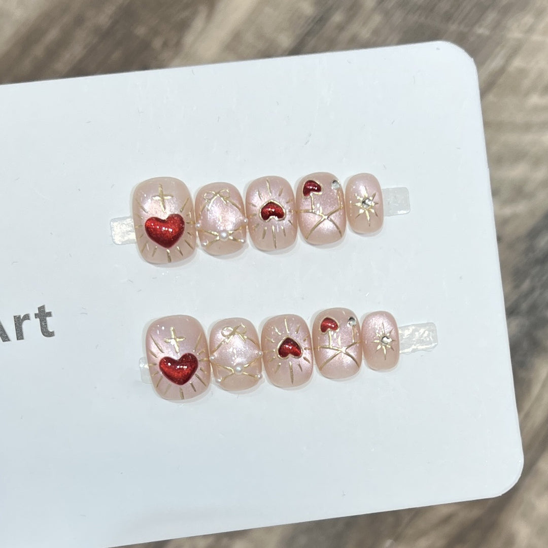 Künstlerisches Herz-Themen Press-On Nail Art Set Karnz