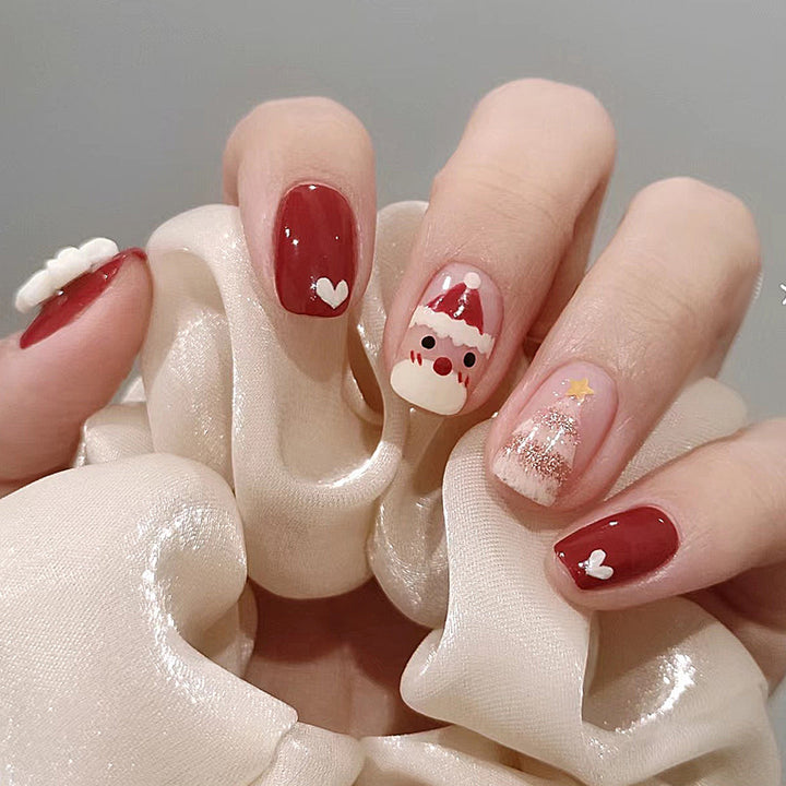 Urlaubs-Themen Press-On Nail Set mit lustigen Weihnachtsmann- und Herzdesigns Karnz