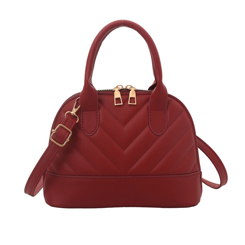 Gepatchte Mini-Handtasche Karnz