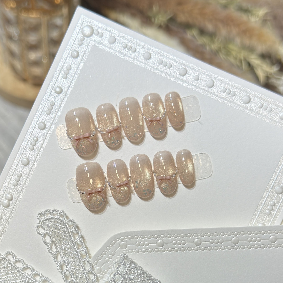Press-On-Nagelkunst-Set mit eleganten Schleifenakzenten Karnz