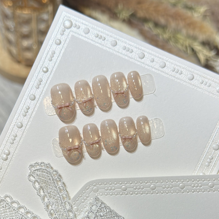 Press-On-Nagelkunst-Set mit eleganten Schleifenakzenten Karnz