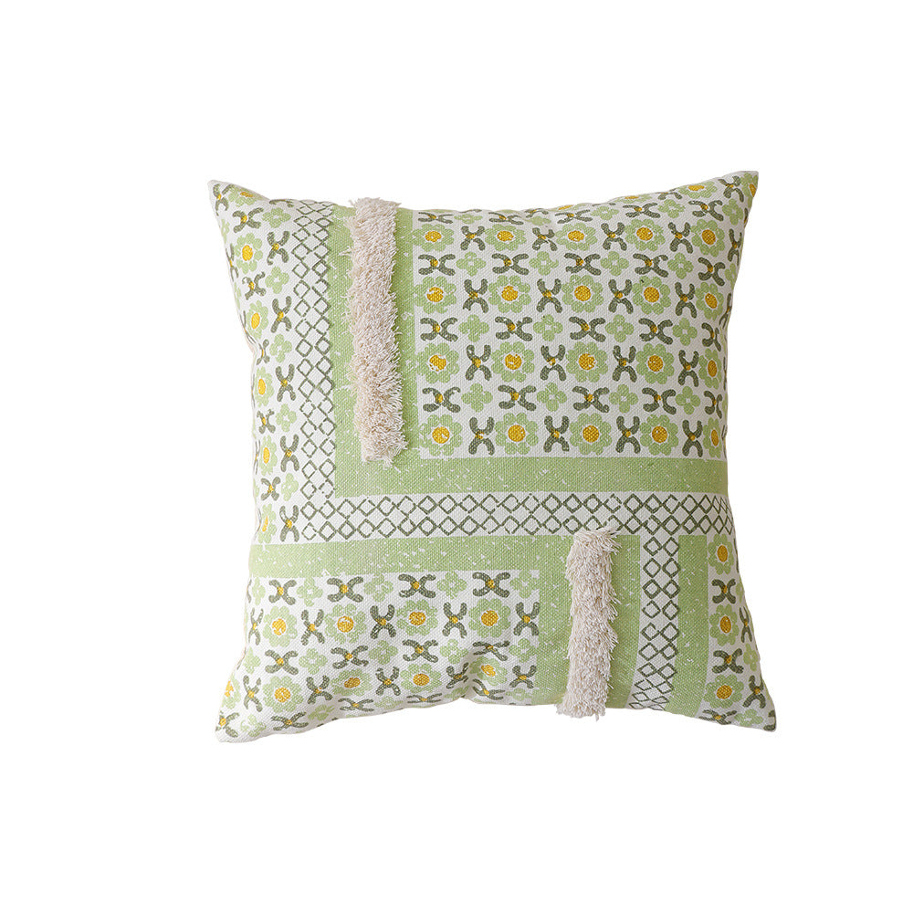 Gewebtes Dekokissen mit botanischem Jacquardmuster und Bommelbesatz