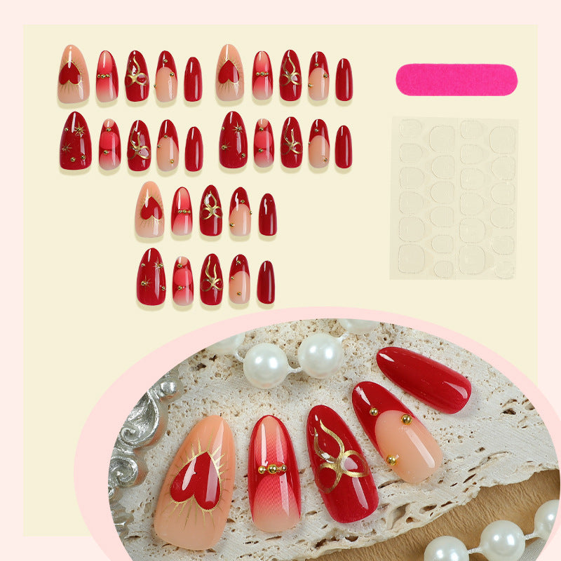 Dekorativer Press-On-Nagelset mit eleganten Herz- und Blumendesigns Karnz