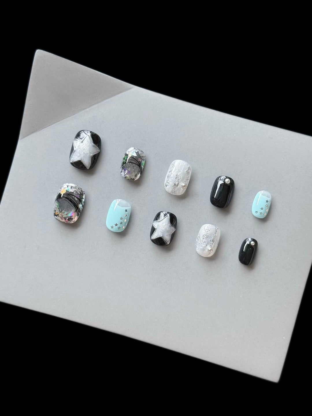 Dekoratives Press-On Nagelkunst-Set mit kosmischem Stern-Thema