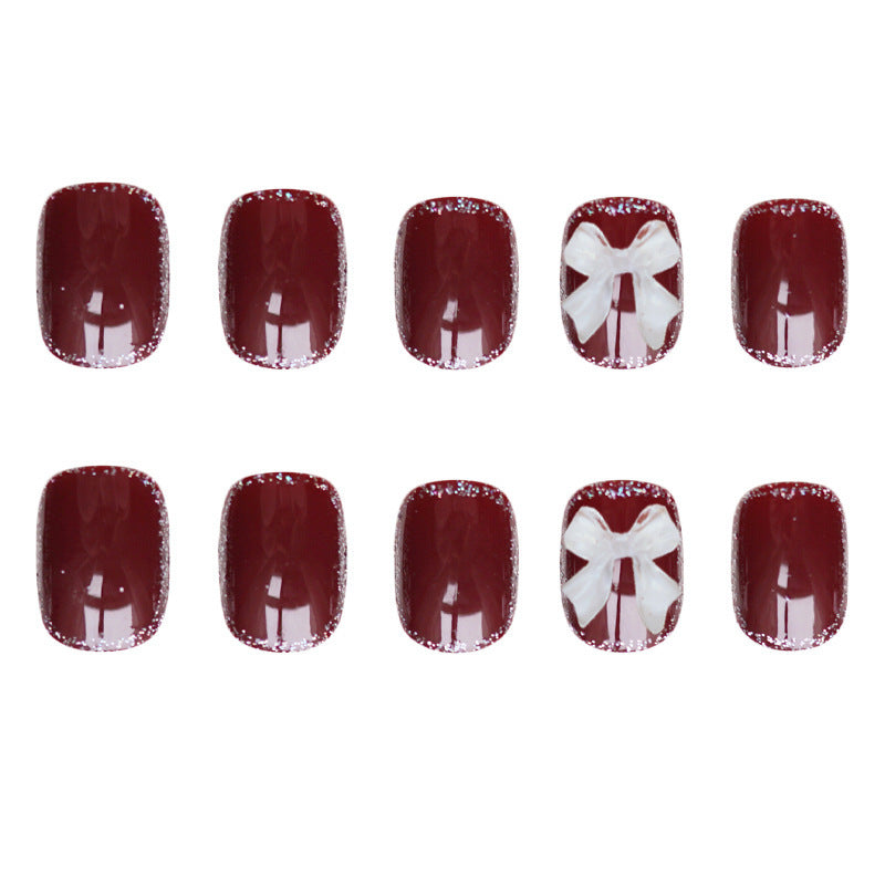 Künstlerisches Press-on-Nagelset mit Schleifen-Design