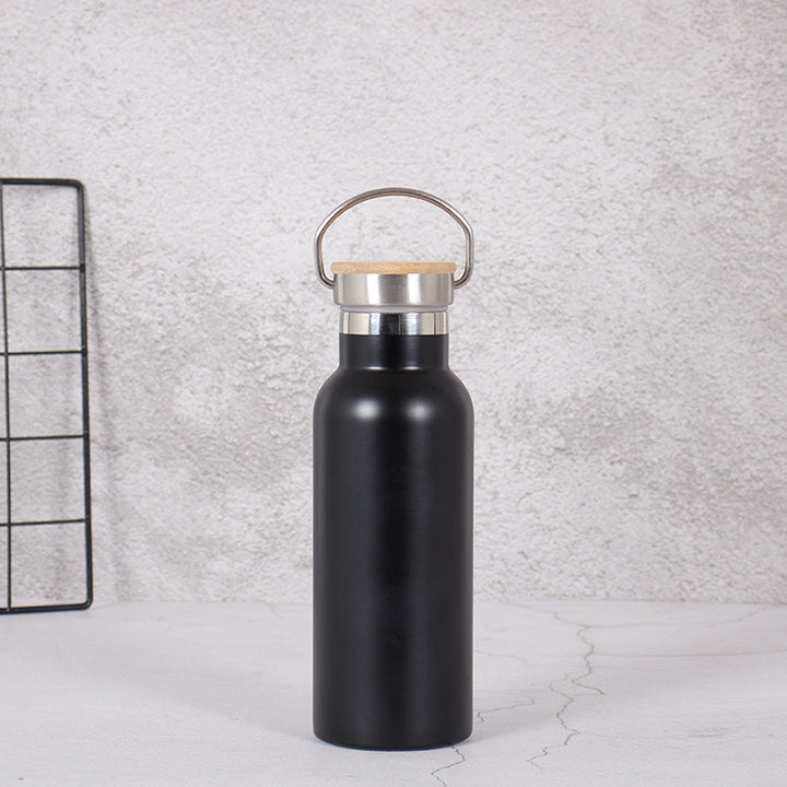 Damen Edelstahl Trinkflasche mit Bambusdeckel und Tragegriff Karnz