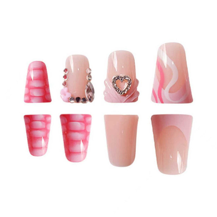 Dekoratives Press-On-Nageldesign mit Herz- und Edelsteinakzenten Karnz