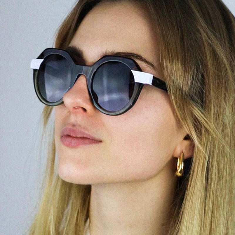 Damen extravagante runde Sonnenbrille mit farblich akzentuiertem Rahmen Karnz