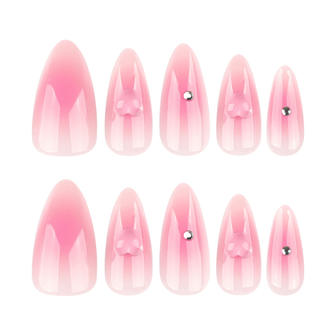 Kunstvolle Stiletto-Nägel mit Herzdesign und Glitzerakzenten Karnz