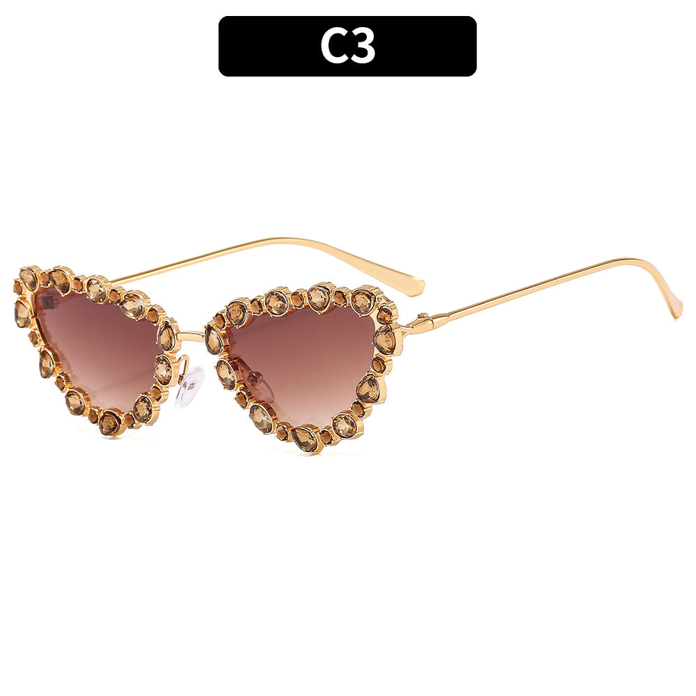 Herzförmige, mit Strass veredelte Sonnenbrille