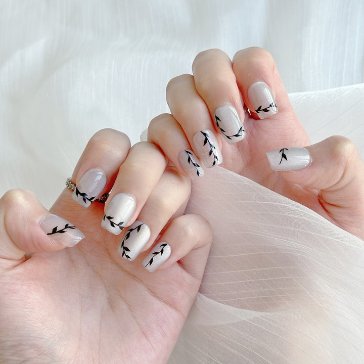 Künstlerisches Press-On Nagelset mit botanischen Designs
