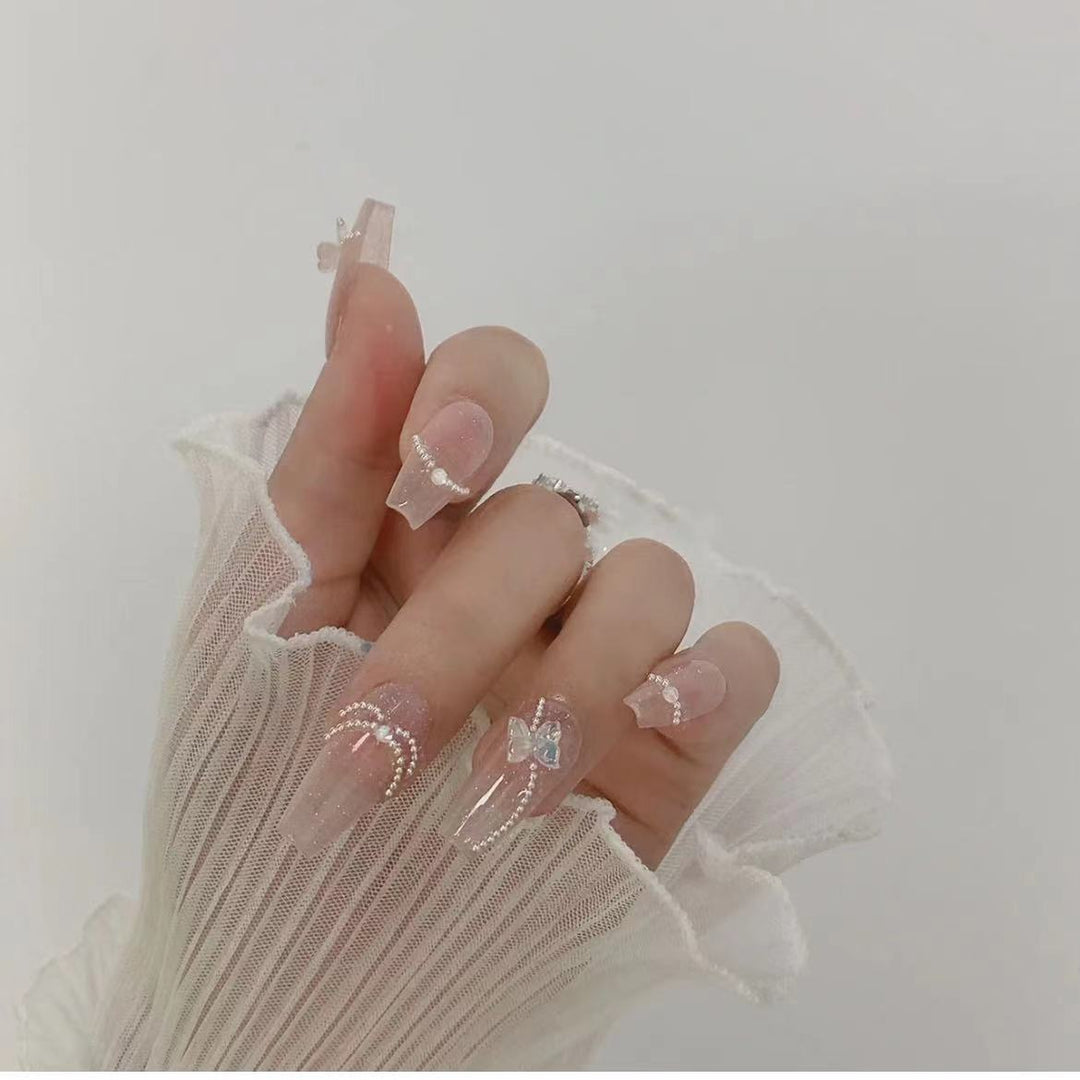 Dekoratives Press-On Nagelset mit Kristallakzenten