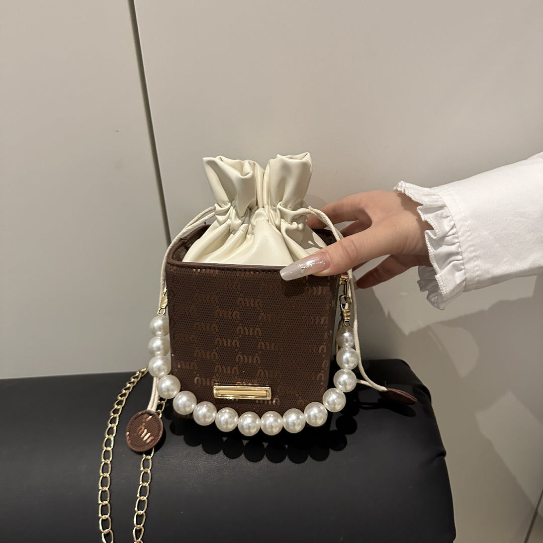 Elegante Mini-Eimer-Tasche mit Perlenhenkel Karnz