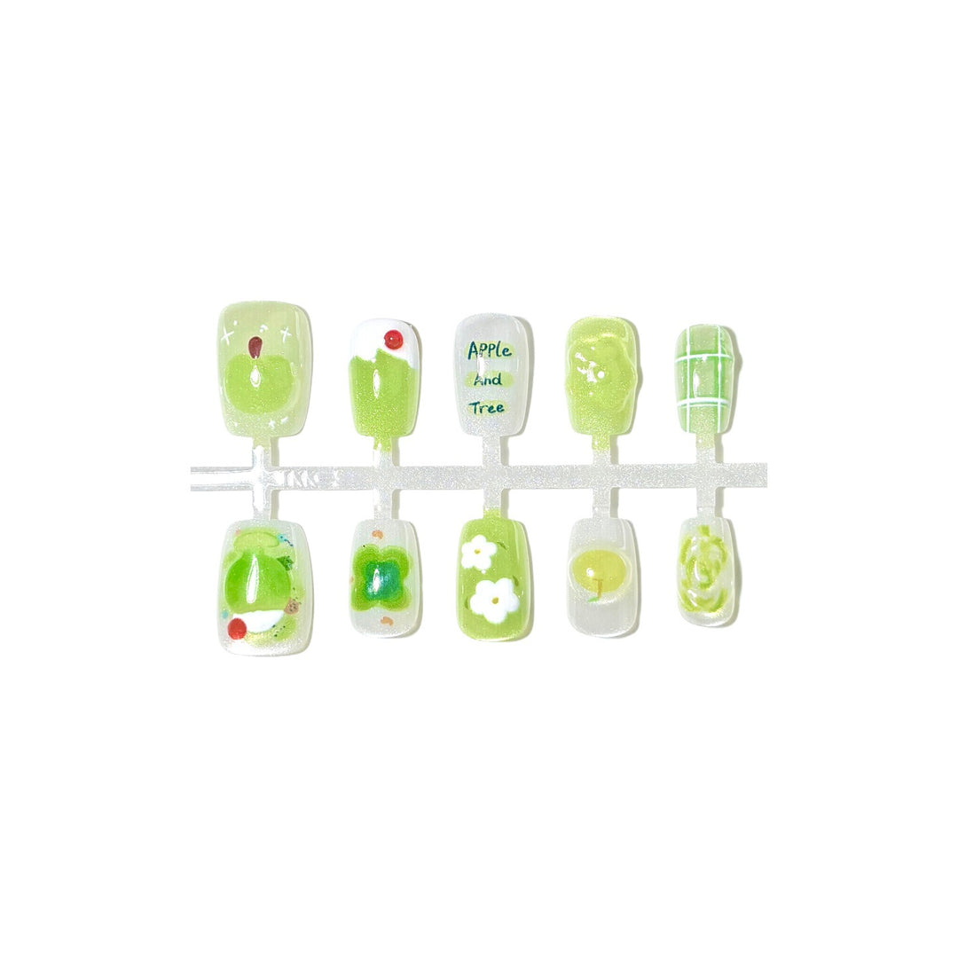 Künstlerisches Press-On Nageldesign Set mit Apfel- und Blumenmotiv