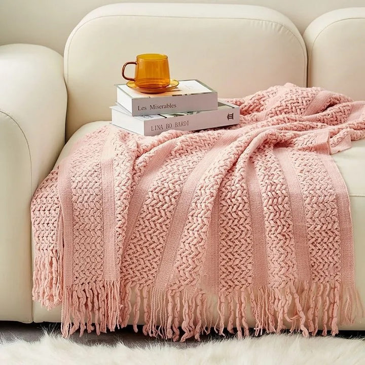 Gemütliche Strickwurfdecke