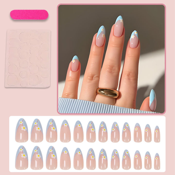 Kunstnagelset mit eleganten Blumen- und Pastellverzierungen Karnz