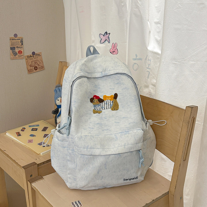 Verspielt bestickter Rucksack