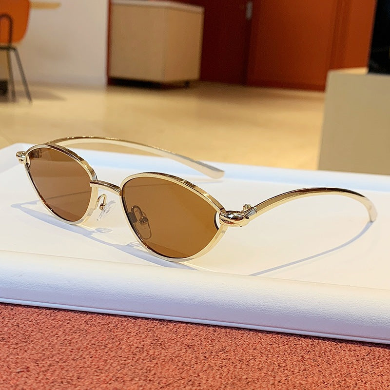 Damen Designer-Sonnenbrille mit elegantem Metallgestell und schützenden Gläsern Karnz