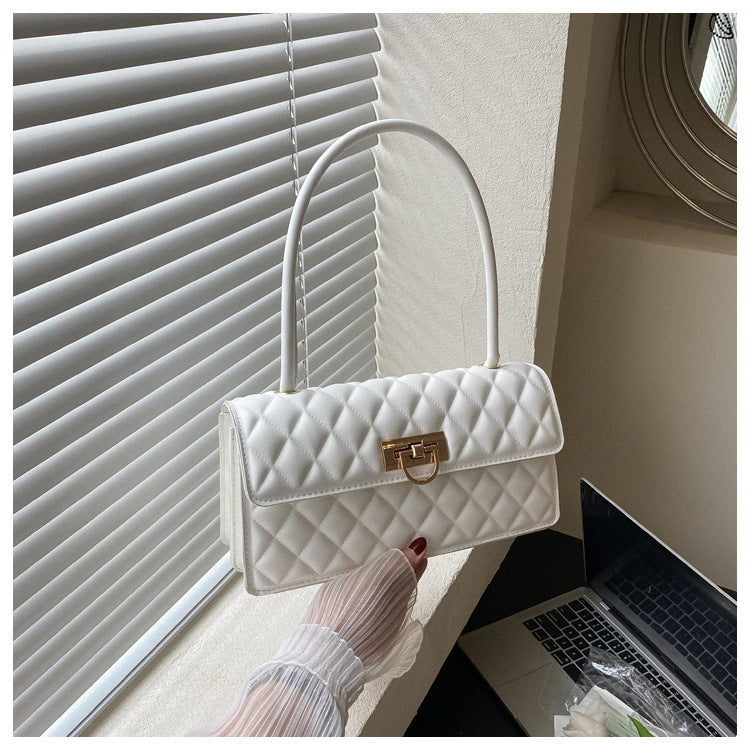 Elegante gestepptes Handtasche