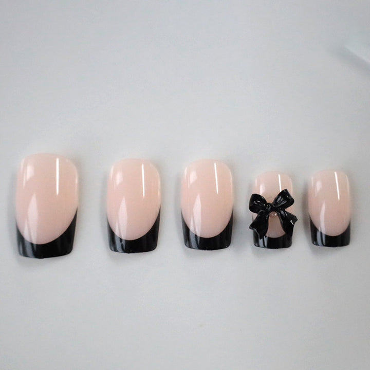 Elegantes Nagelkunstset mit Schleifenverzierung Karnz