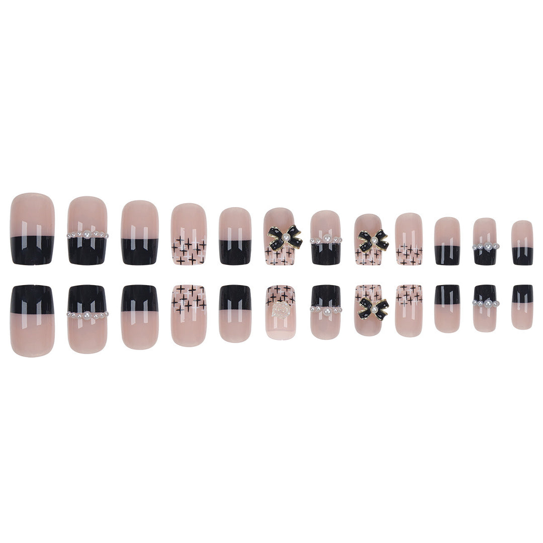 Dekoratives Press-On-Nagelset mit eleganten Schleifenakzenten Karnz
