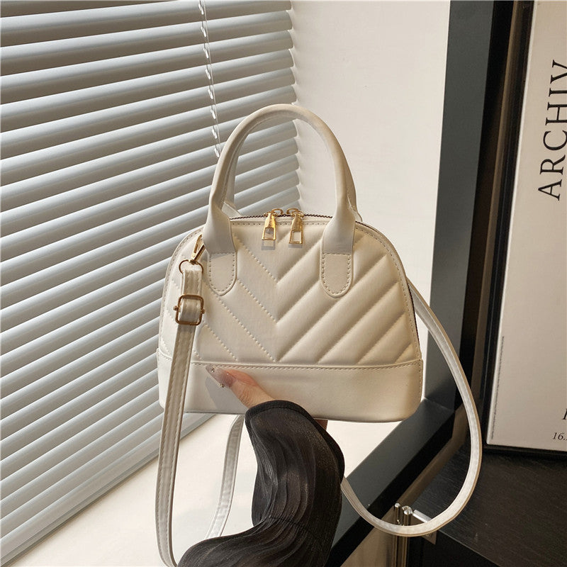 Gepatchte Mini-Handtasche Karnz
