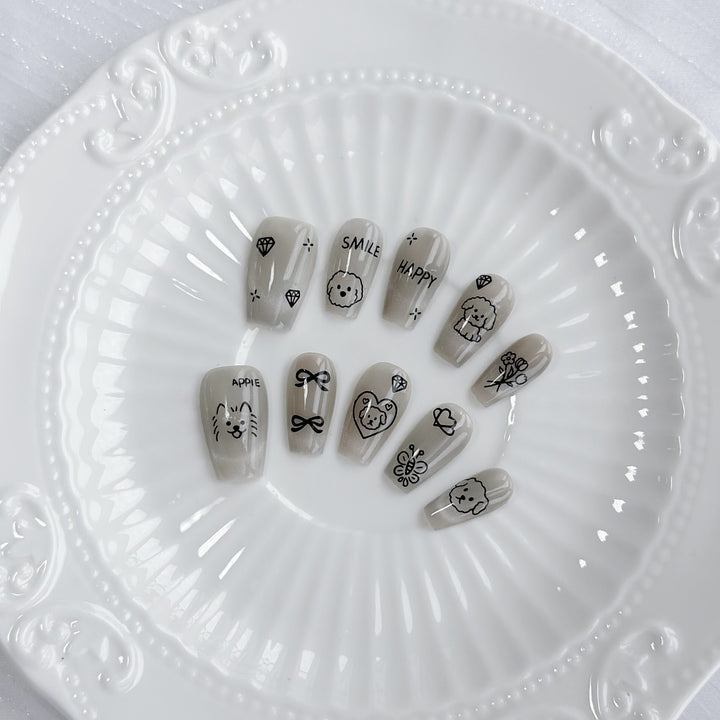 Künstlerisches Press-On Nagelkunstset mit Herz- und himmlischen Designs