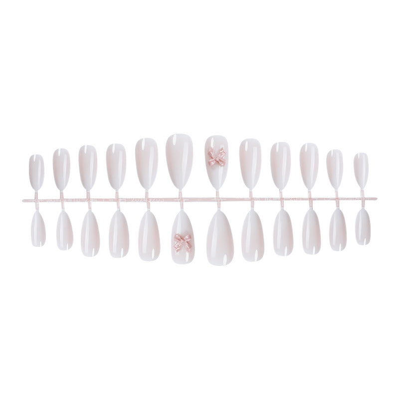 Elegantes Press-On Nail Art Set mit glänzender Oberfläche und süßen Schleifendetails Karnz