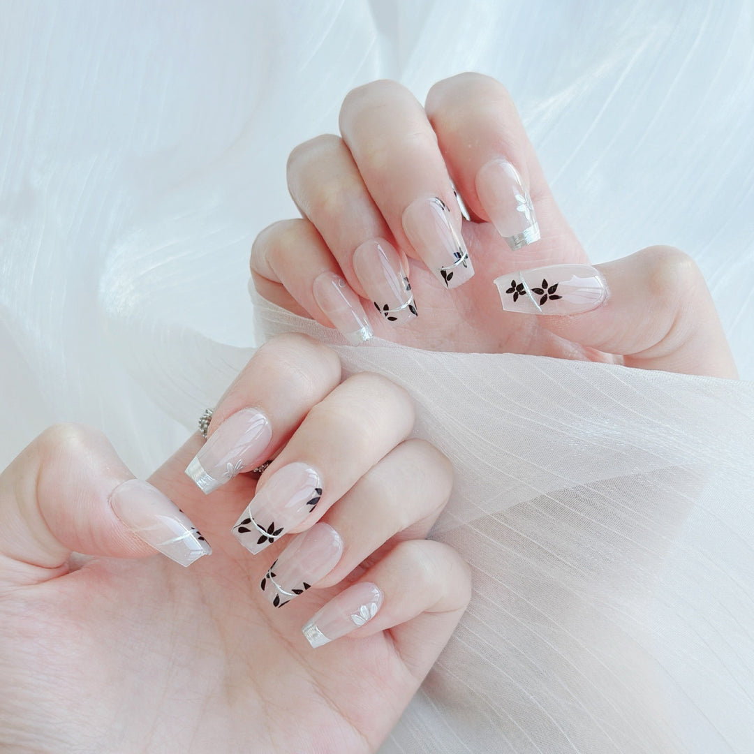 Künstlerisches Floral Press-On Nagelset mit glänzendem Finish
